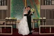 bride-groom-hugging-altar