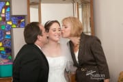 brides-parents-kissing-bride-bridalroom