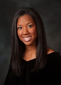 Senior girl in traditional black drape, future leaders of the Antelope Valley